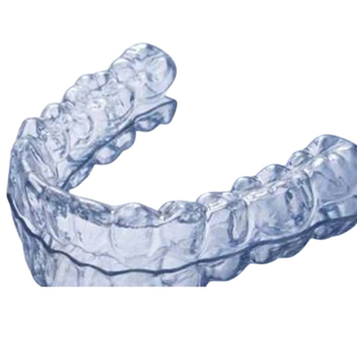 Tratamiento ortodóntico fijo y invisible para la investigación dental